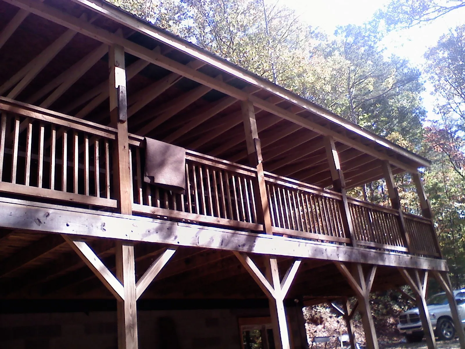 Timber framing under a new elevated porch and deck — Roof Leak Repair in Ottine by Roofing Brothers